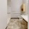 a bathroom with a toilet and sink